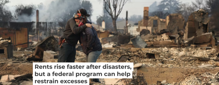 Two people embrace on Jan. 9, 2025, in Altadena, Calif., amid property destroyed by the Eaton Fire. Justin Sullivan/Getty Images